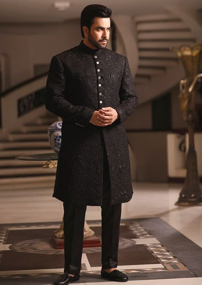 Black Sherwani Designs for a Dazzling Ethnic Look Black Sherwani Designs,Black Sherwani Designs for Ethnic Look,Black Sherwani,Black Sherwani For Groom,Black Velvet Sherwani Design,Designer Black Sherwani,Black and Red Sherwani