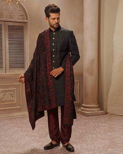 Black Sherwani Designs for a Dazzling Ethnic Look Black Sherwani Designs,Black Sherwani Designs for Ethnic Look,Black Sherwani,Black Sherwani For Groom,Black Velvet Sherwani Design,Designer Black Sherwani,Black and Red Sherwani