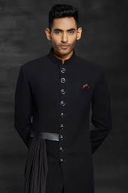 Black Sherwani Designs for a Dazzling Ethnic Look Black Sherwani Designs,Black Sherwani Designs for Ethnic Look,Black Sherwani,Black Sherwani For Groom,Black Velvet Sherwani Design,Designer Black Sherwani,Black and Red Sherwani