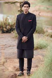 Black Sherwani Designs for a Dazzling Ethnic Look Black Sherwani Designs,Black Sherwani Designs for Ethnic Look,Black Sherwani,Black Sherwani For Groom,Black Velvet Sherwani Design,Designer Black Sherwani,Black and Red Sherwani